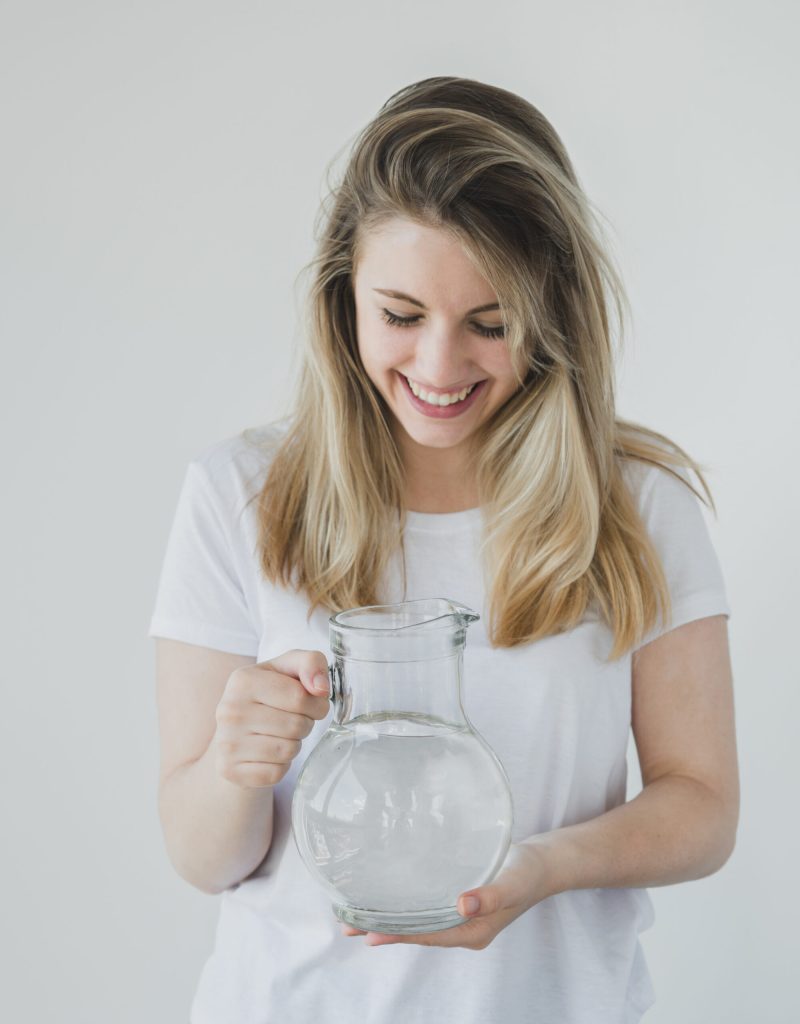 blonde-girl-holding-jar-water